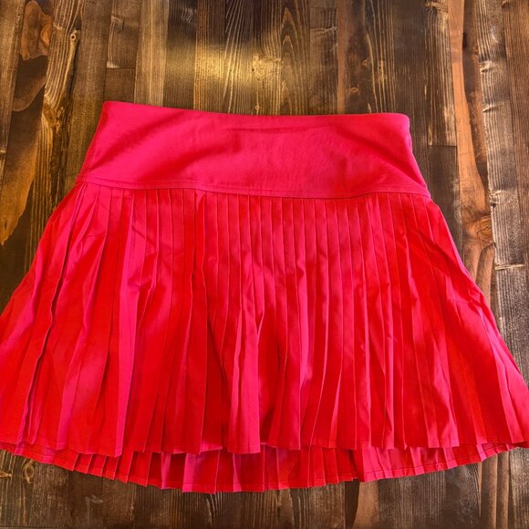 NWT Fabletics pleated tennis skirt with attached shorts, bright red, size medium - Picture 1 of 4